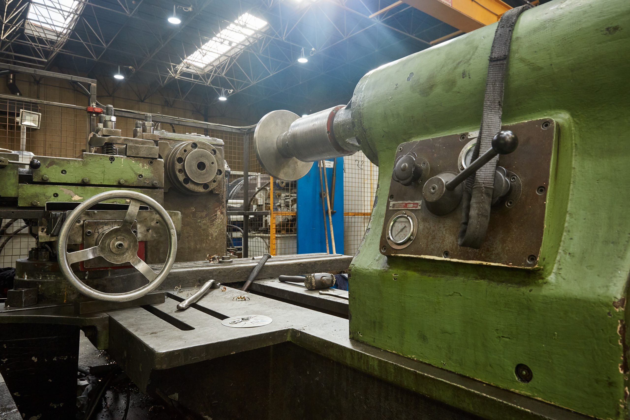 Metal fabrication machine not in use with tools surrounding it