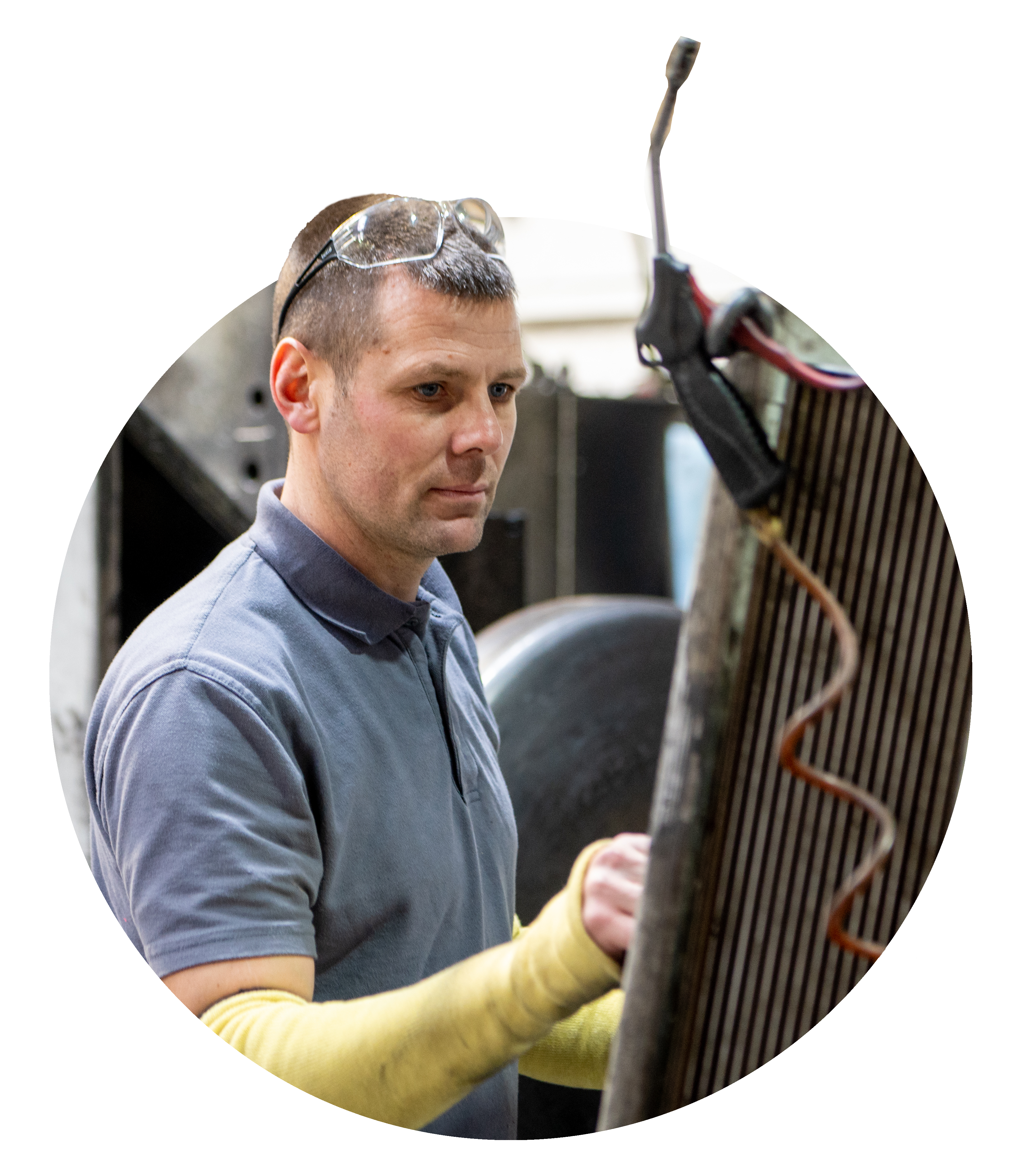 Man working in metal spinning facility