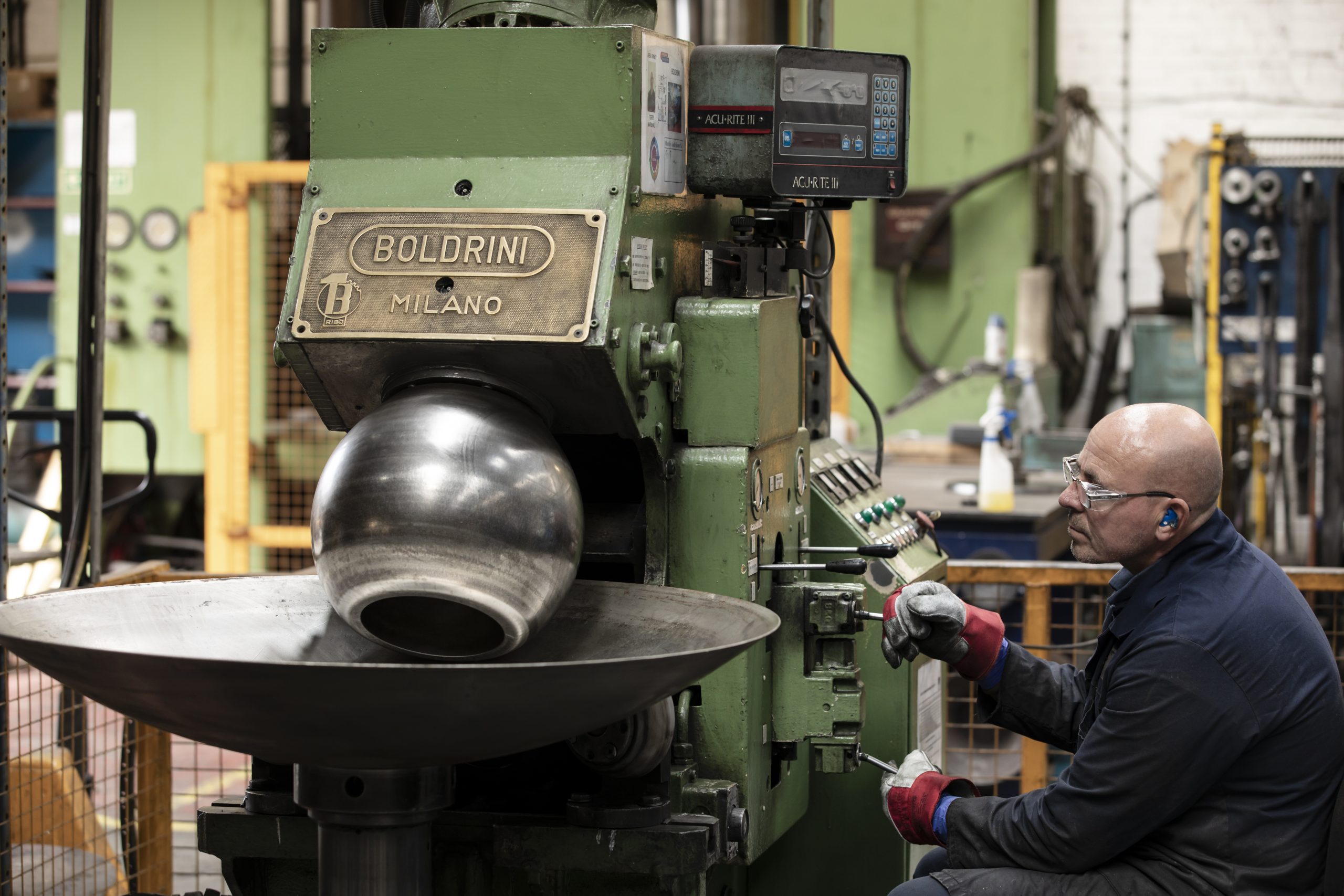 metal worker using machinery